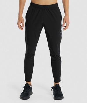 Black Gymshark Arrival Woven Men's Jogger | YKLNUF306