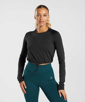 Black Gymshark Sweat Seamless Long Sleeve Crop Women's Tops | TMSKOF458