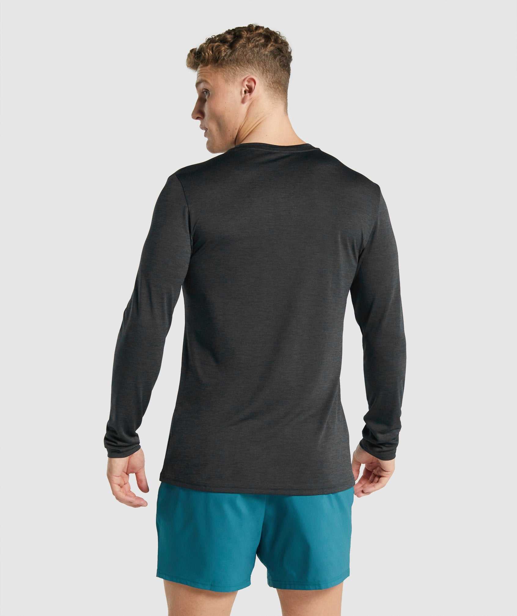 Black Gymshark Arrival Marl Long Sleeve Men's T Shirts | ELCXMH506