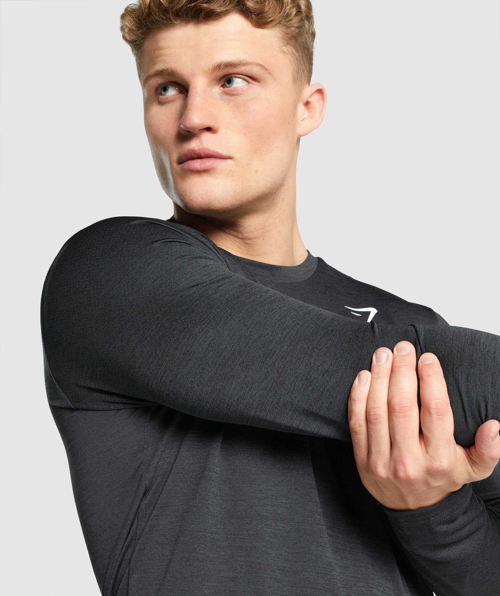 Black Gymshark Arrival Marl Long Sleeve Men's T Shirts | ELCXMH506