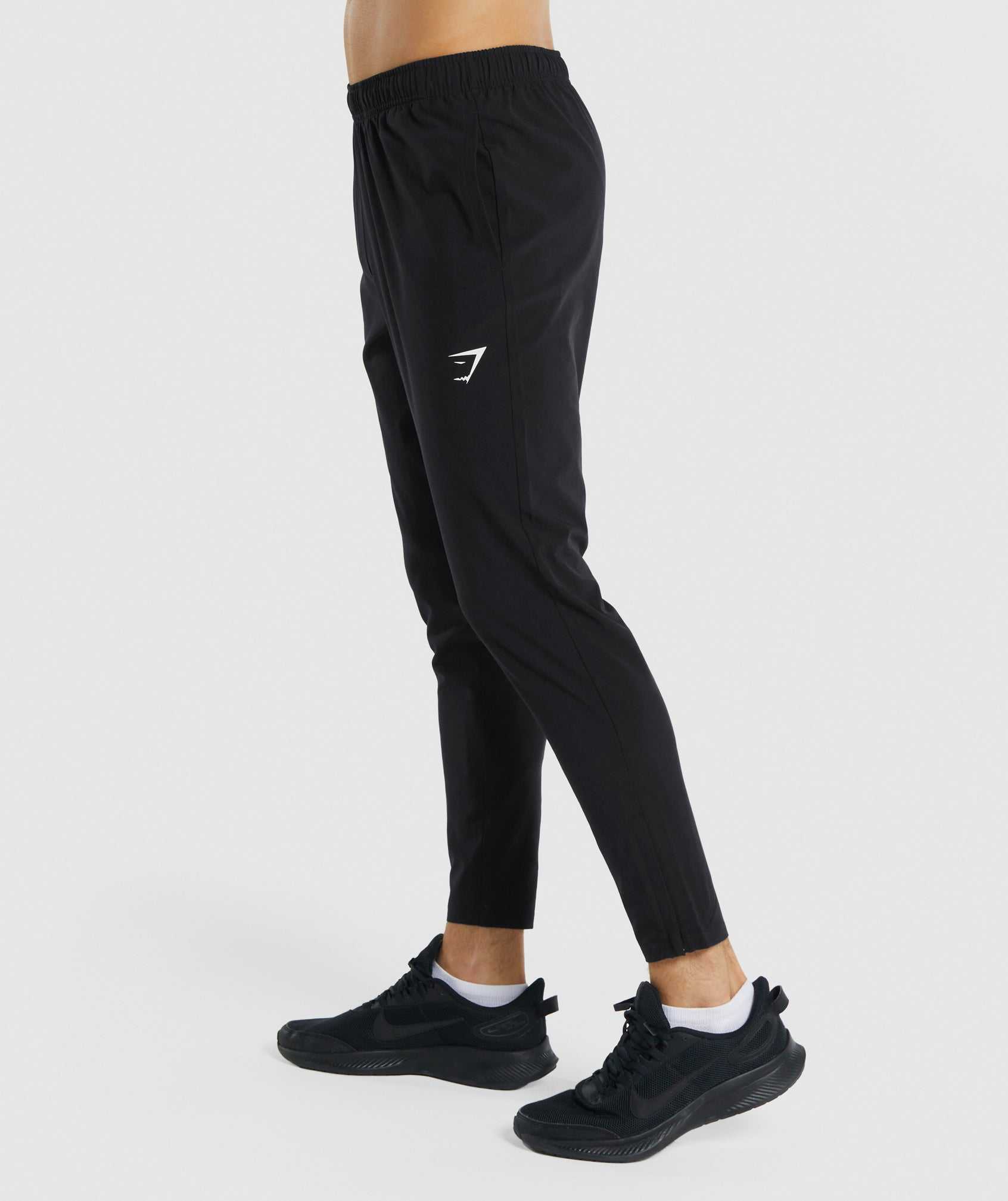 Black Gymshark Arrival Woven Men's Jogger | JMWGEO201