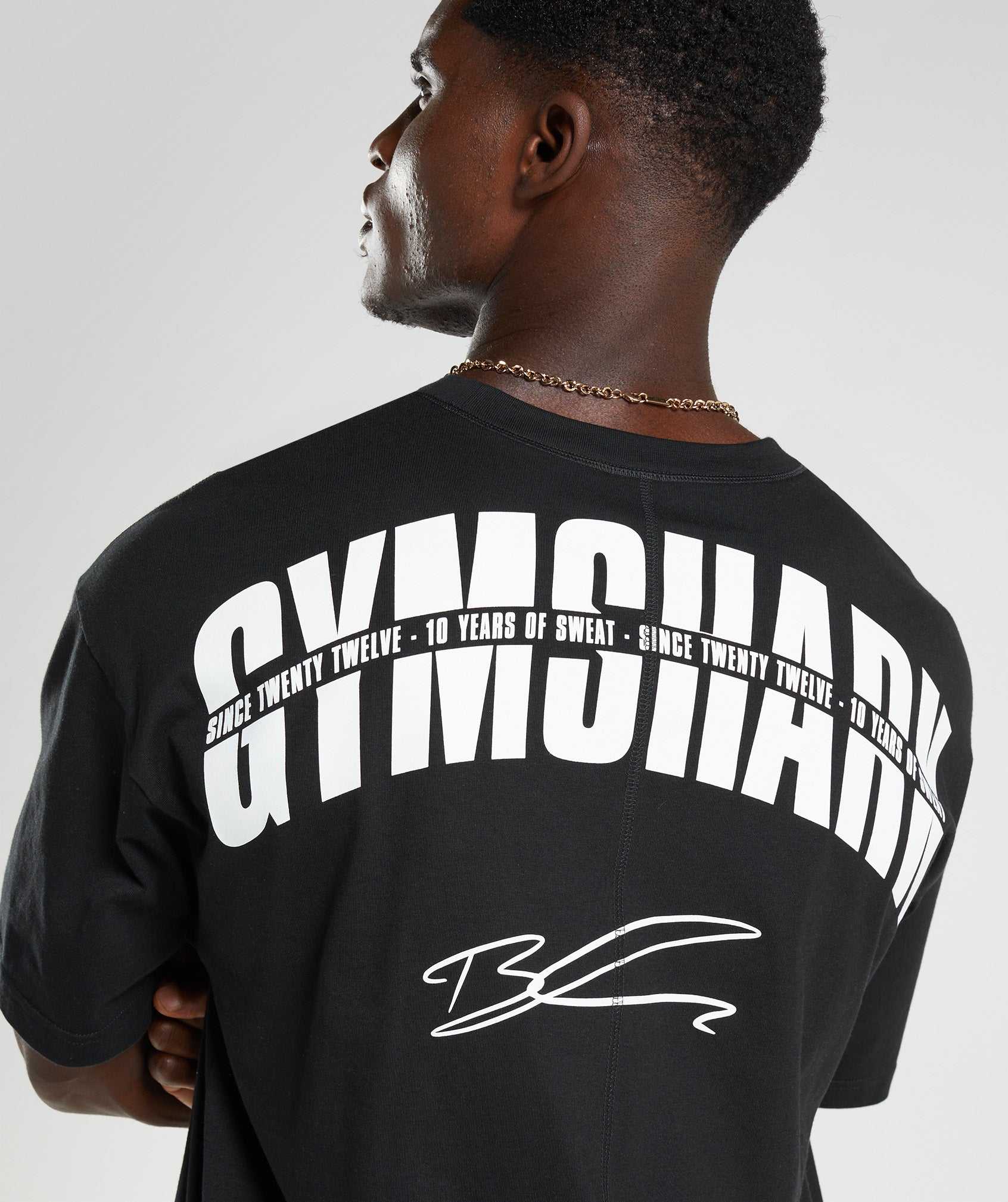 Black Gymshark GS10 Year Oversized Men's T Shirts | ZBXOCA419