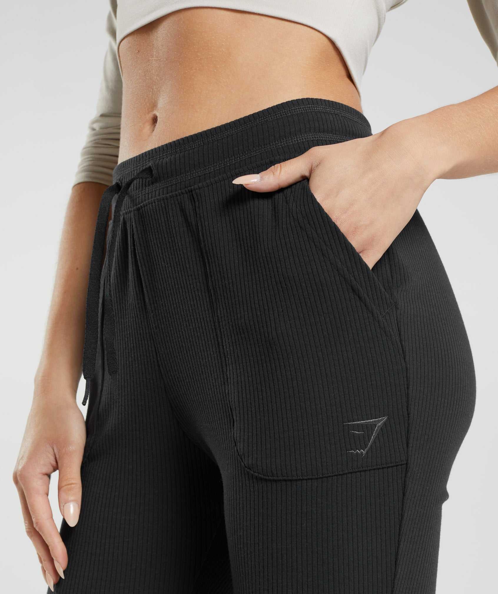 Black Gymshark Pause Flared Pants Women's Jogger | HMWQPC021