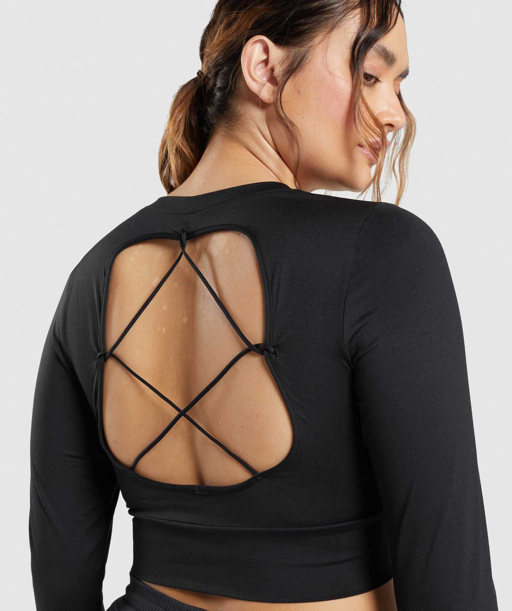 Black Gymshark Pause Open Back Long Sleeve Crop Women's Tops | XAOPFT319