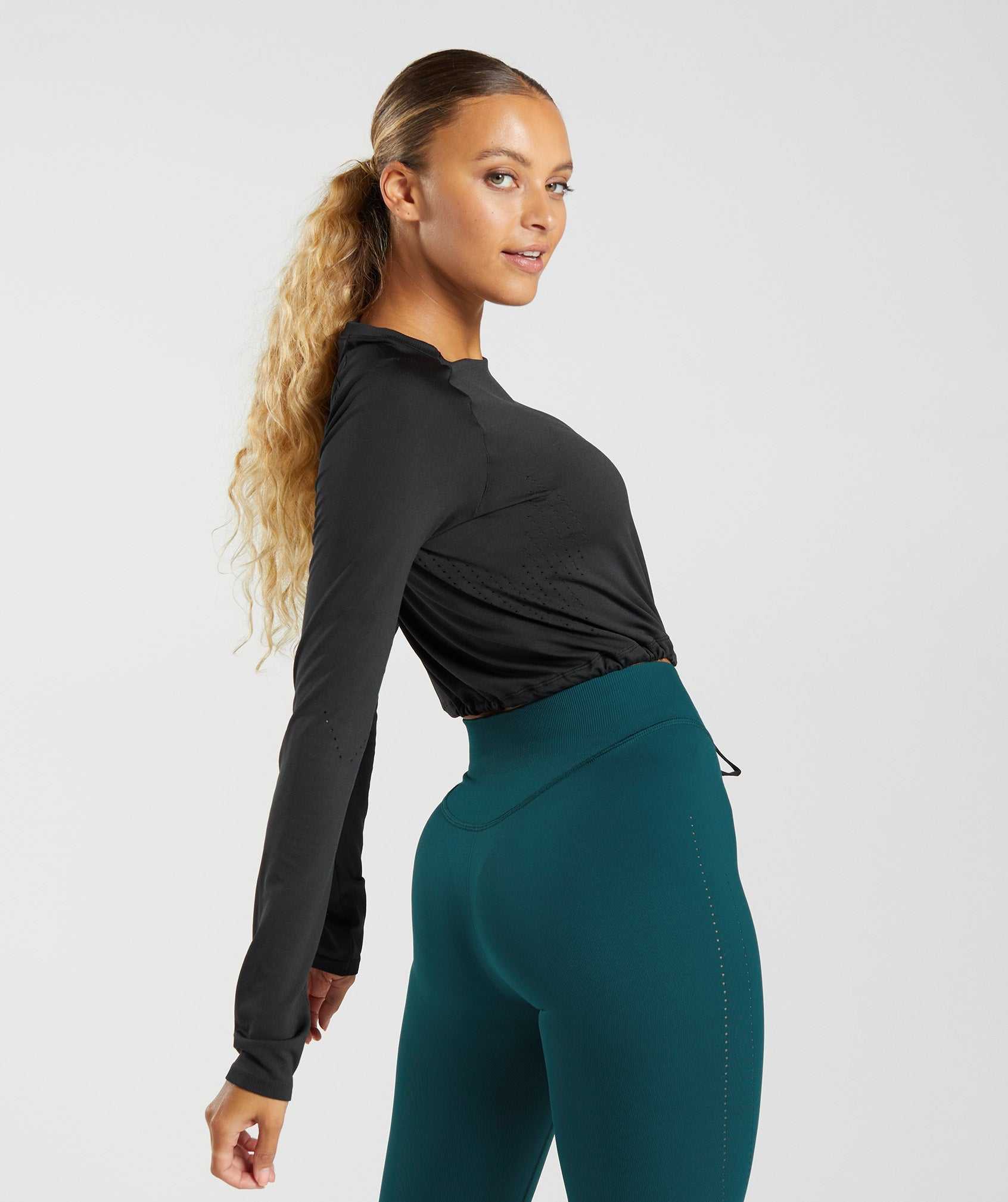 Black Gymshark Sweat Seamless Long Sleeve Crop Women's Tops | TMSKOF458