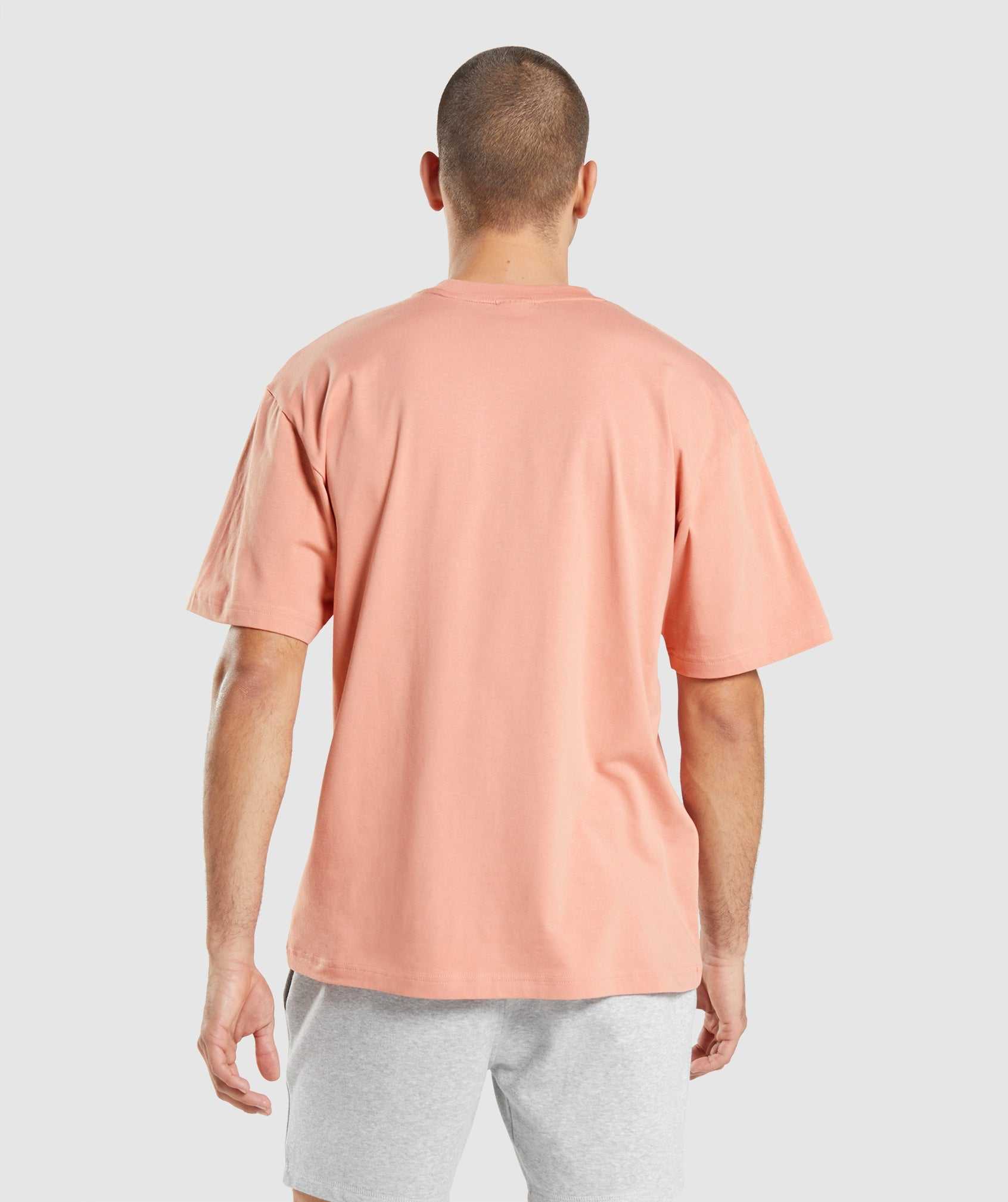 Pink Gymshark Essential Oversized Men's T Shirts | ZLXQSN514