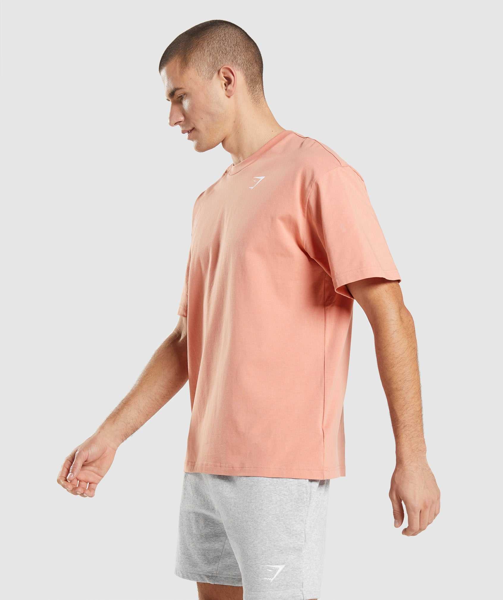 Pink Gymshark Essential Oversized Men's T Shirts | ZLXQSN514