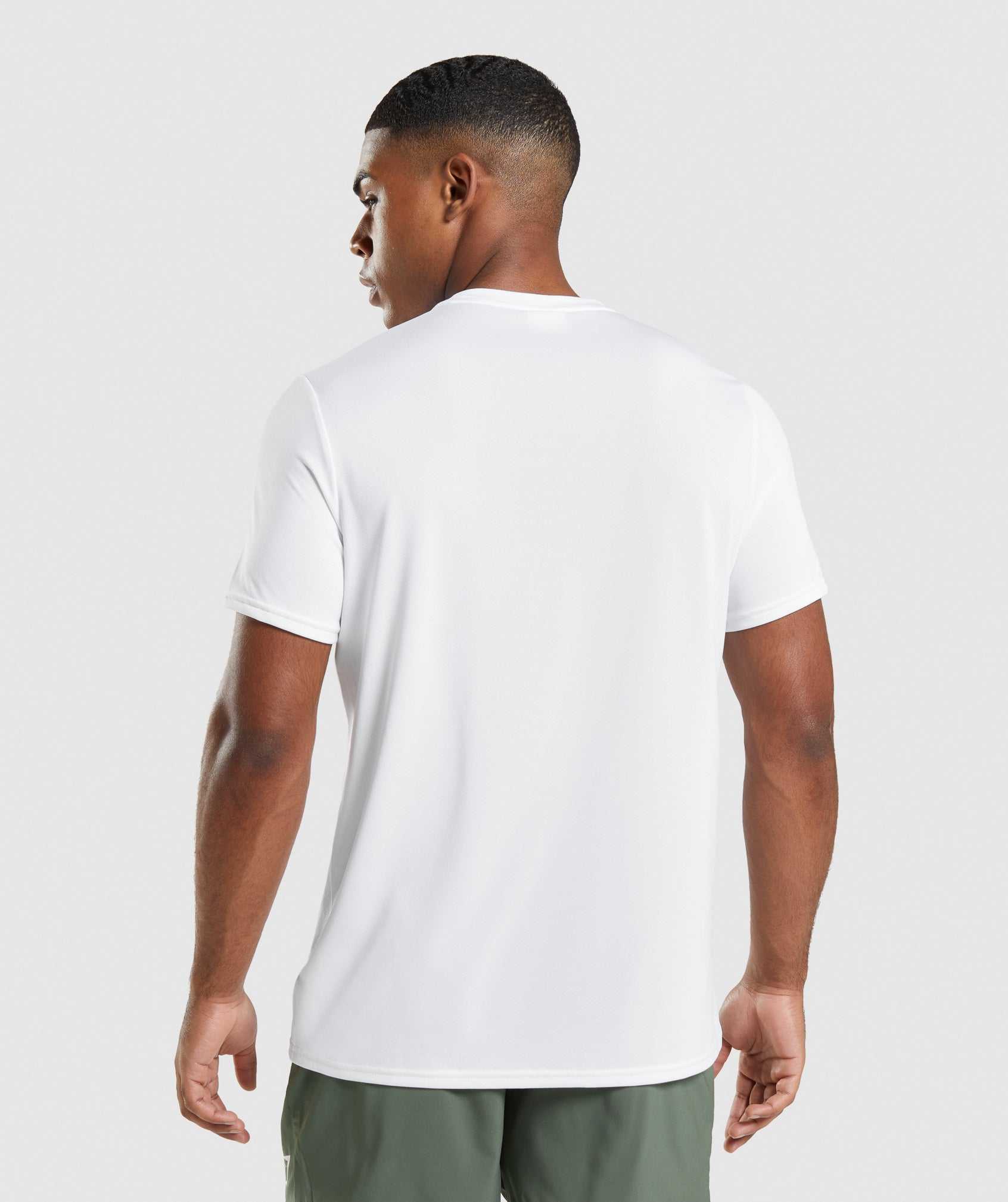 White Gymshark Arrival Regular Fit Men's T Shirts | NZCGDX690