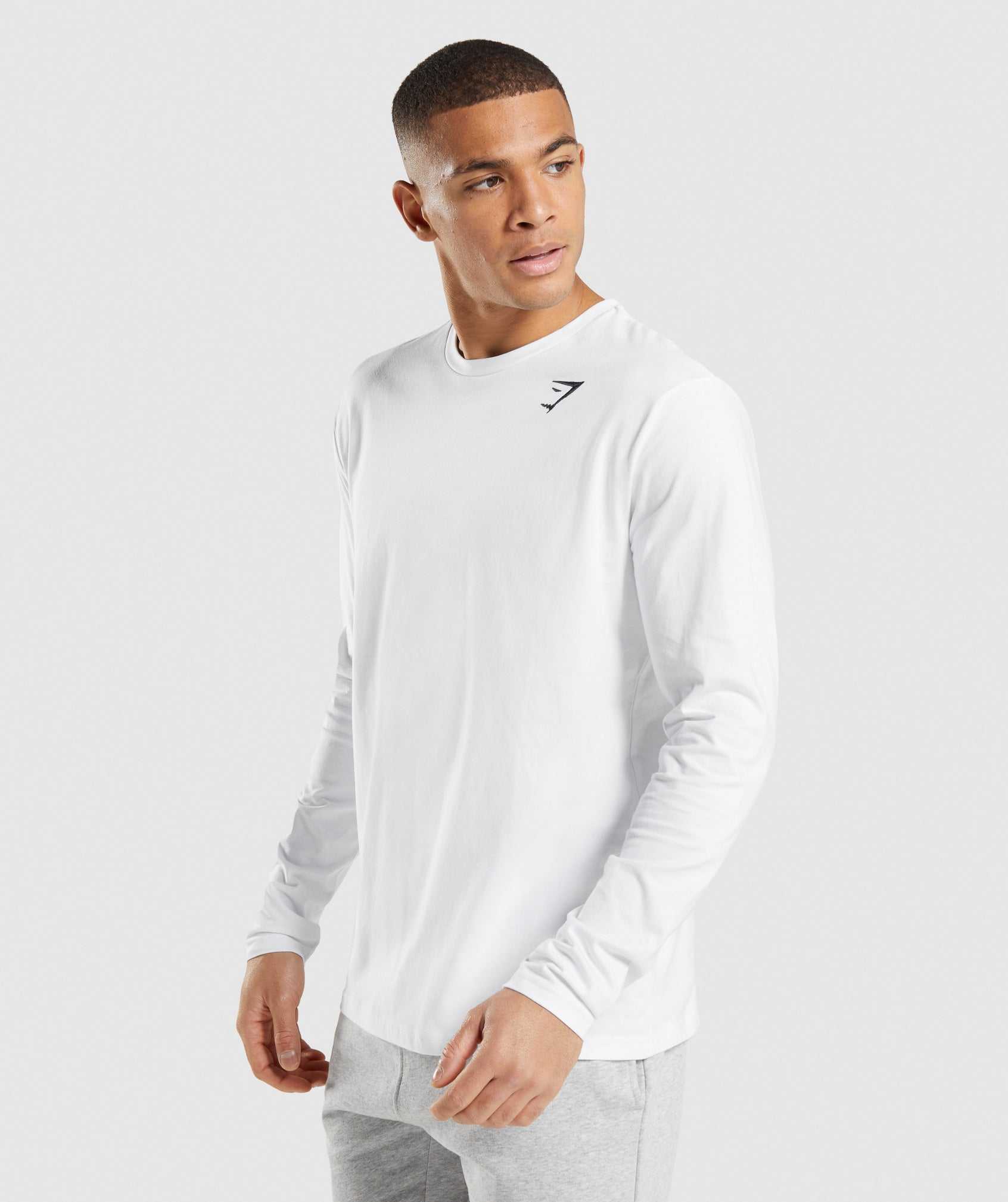 White Gymshark Crest Long Sleeve Men's T Shirts | DRNMOE940