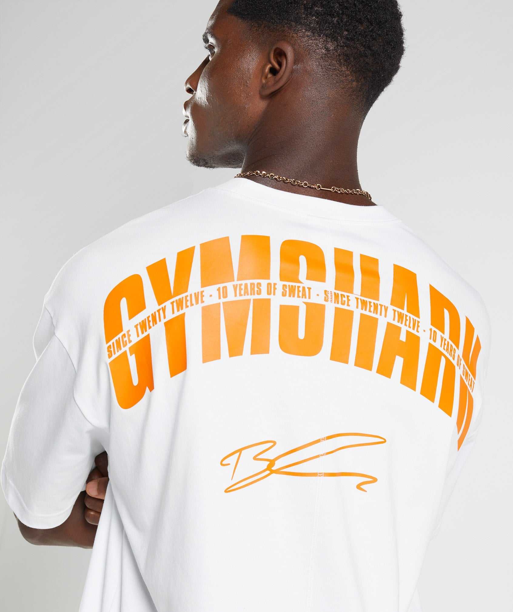 White Gymshark GS10 Year Oversized Men's T Shirts | GBIYTZ645