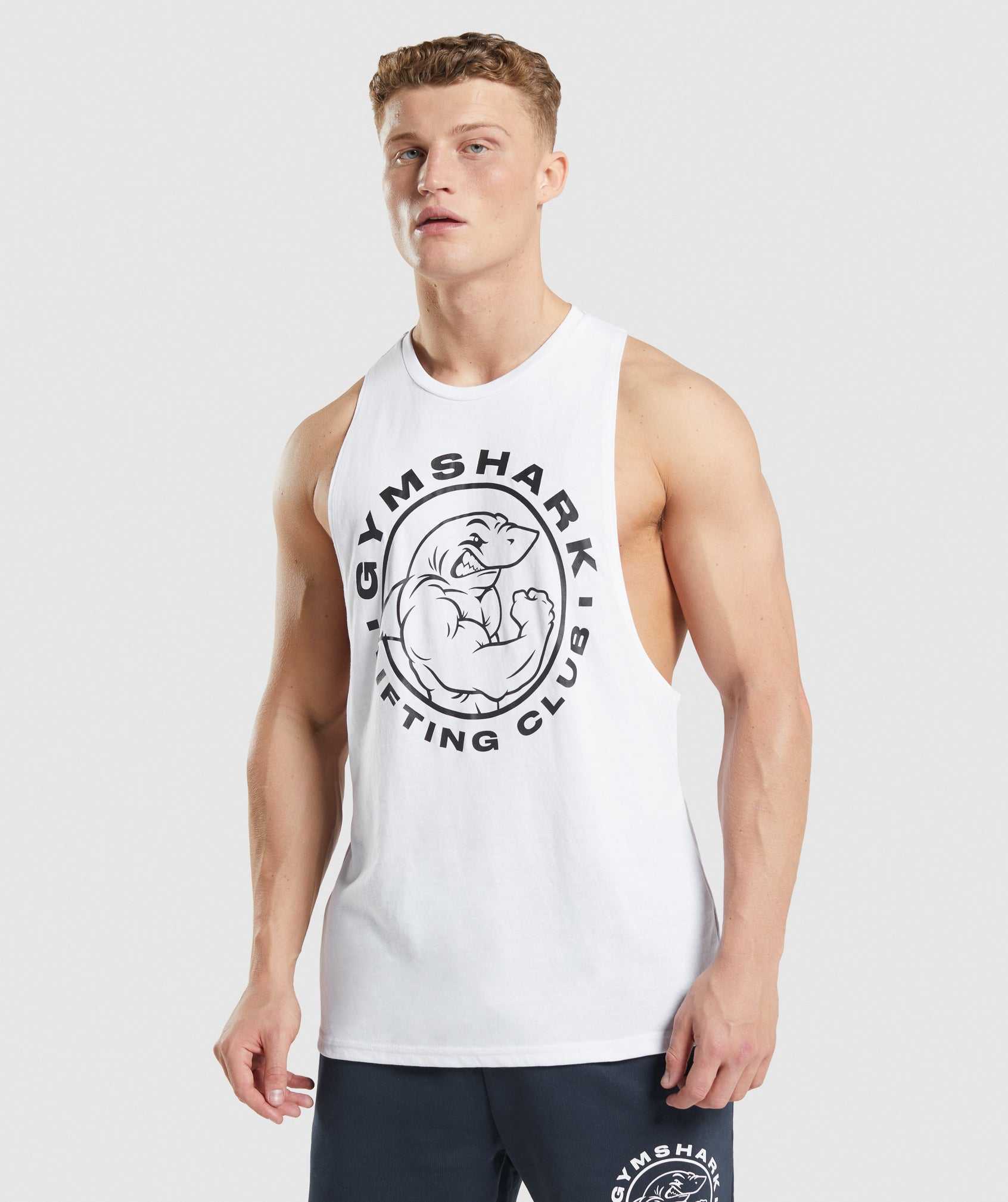 White Gymshark Legacy Drop Arm Men\'s Tanks | WPDGSB591